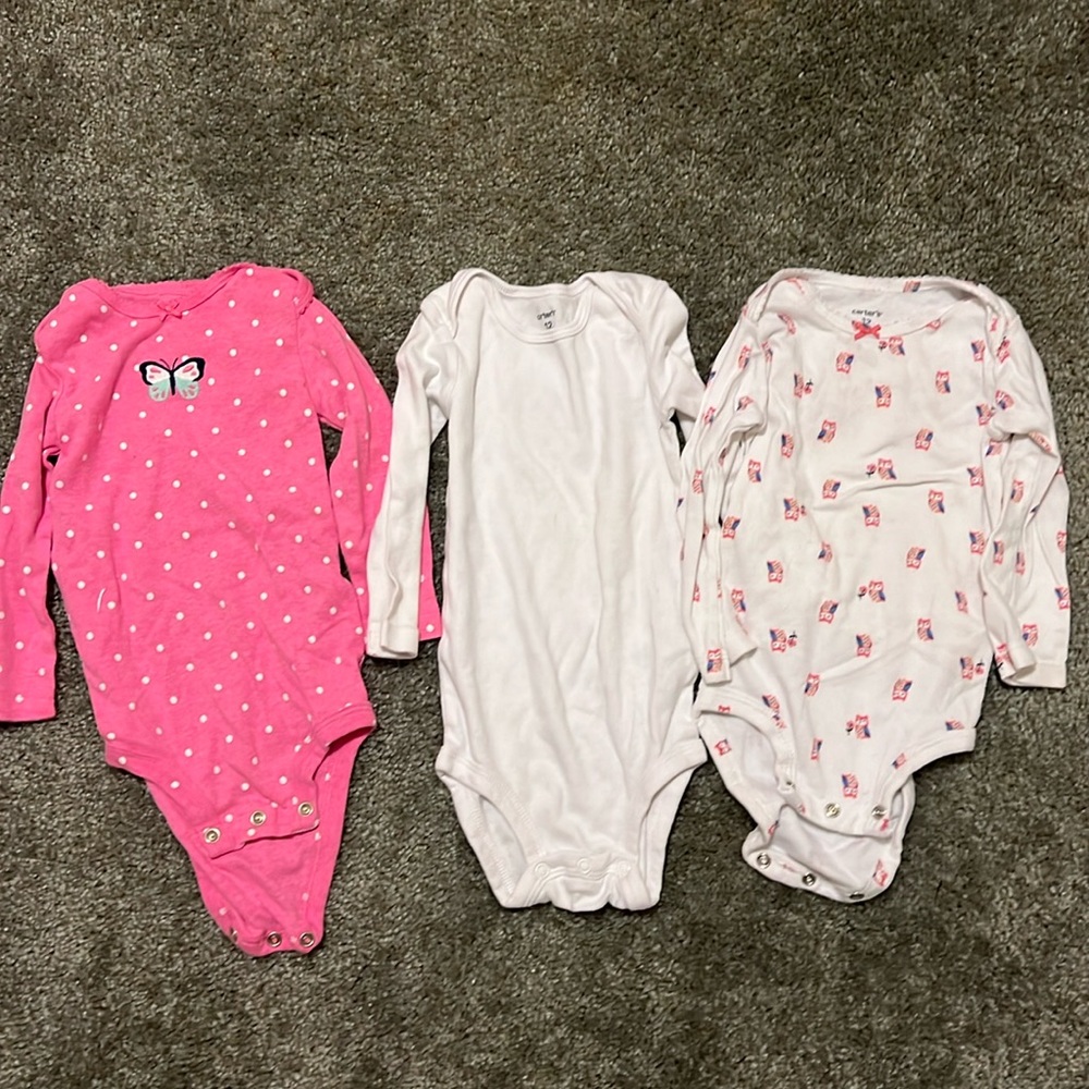 Lot of girls 12 month long sleeve onesies